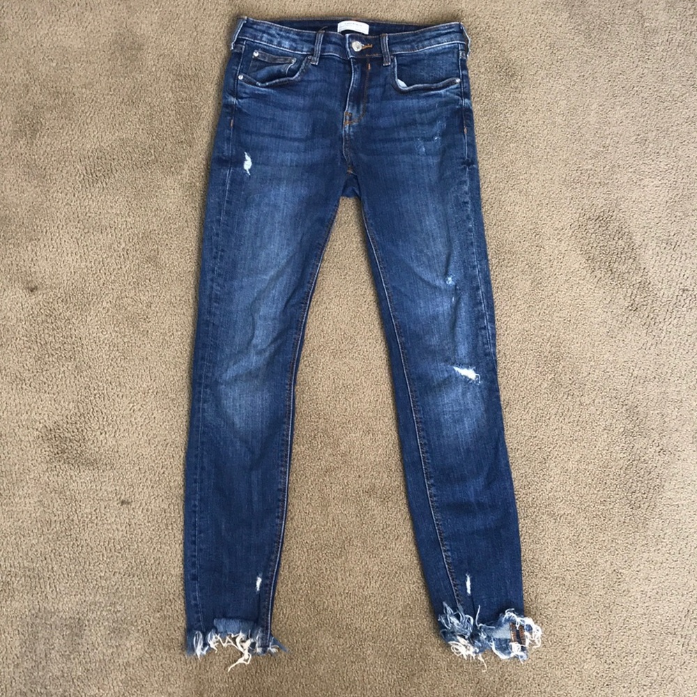 slightly distressed skinny jeans